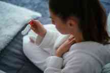 Woman looking at home pregnancy test