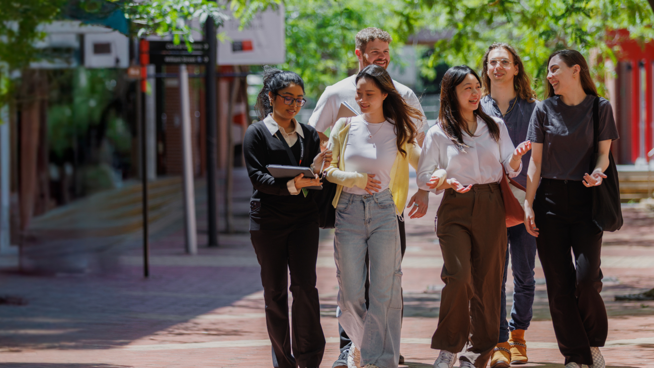 Students walking together around Swinburne Hawthorn campus