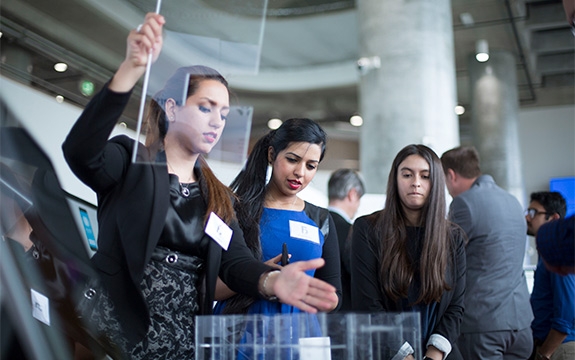 Design Factory Melbourne students Melika Kamali, Arusha Siddiqui, Michelle Rabino with proof of concept prototype for industry partner Access Health 
