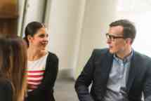 Two students having a discussion on the classroom 