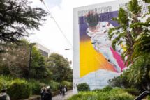 Astronaut mural on swinburne building next to Glenferrie train station 