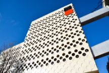 ATC building at Hawthorn in the sun blue sky featuring the Swinburne logo