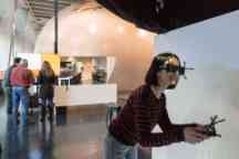 Woman playing with equipment in the Factory of the future building