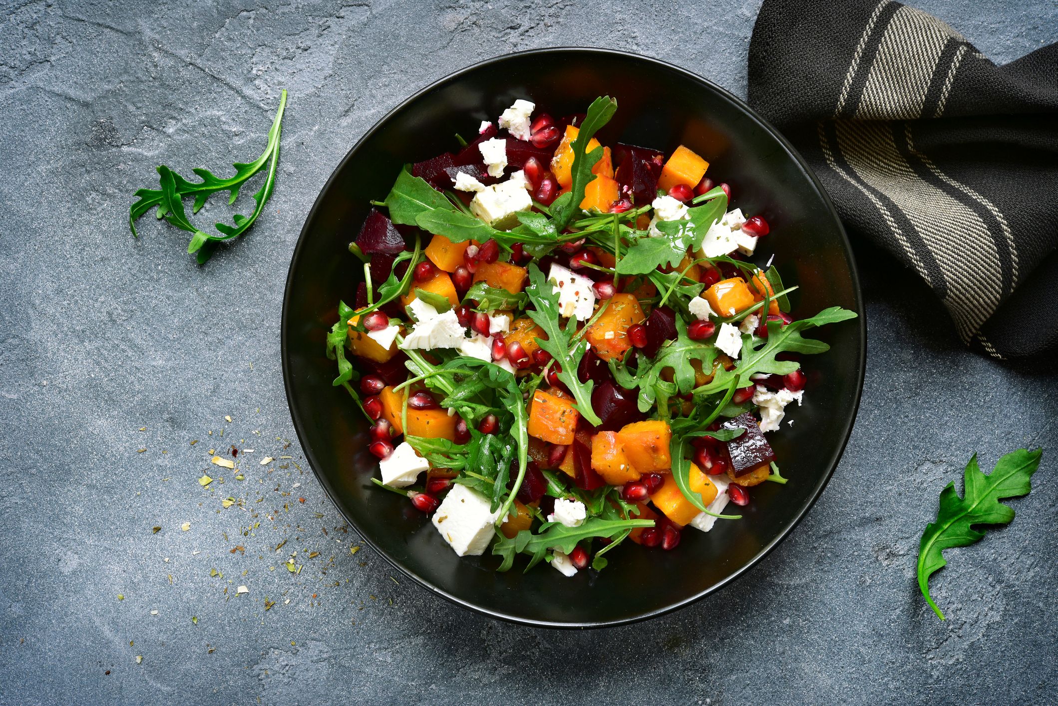 Pumpkin salad with beetroot, arugula and feta cheese