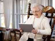 Grandmother Using Tablet Computer