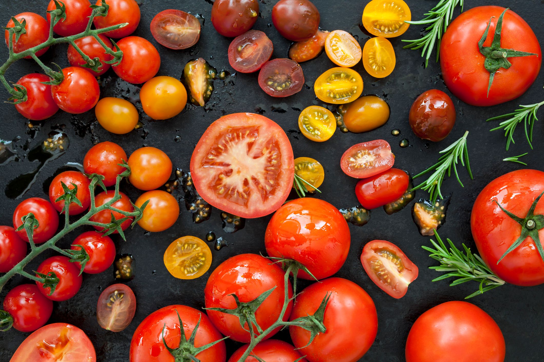 Tomato Varieties on Black Overhead View