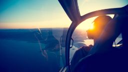 Silhouette of a pilot in airplane cockpit