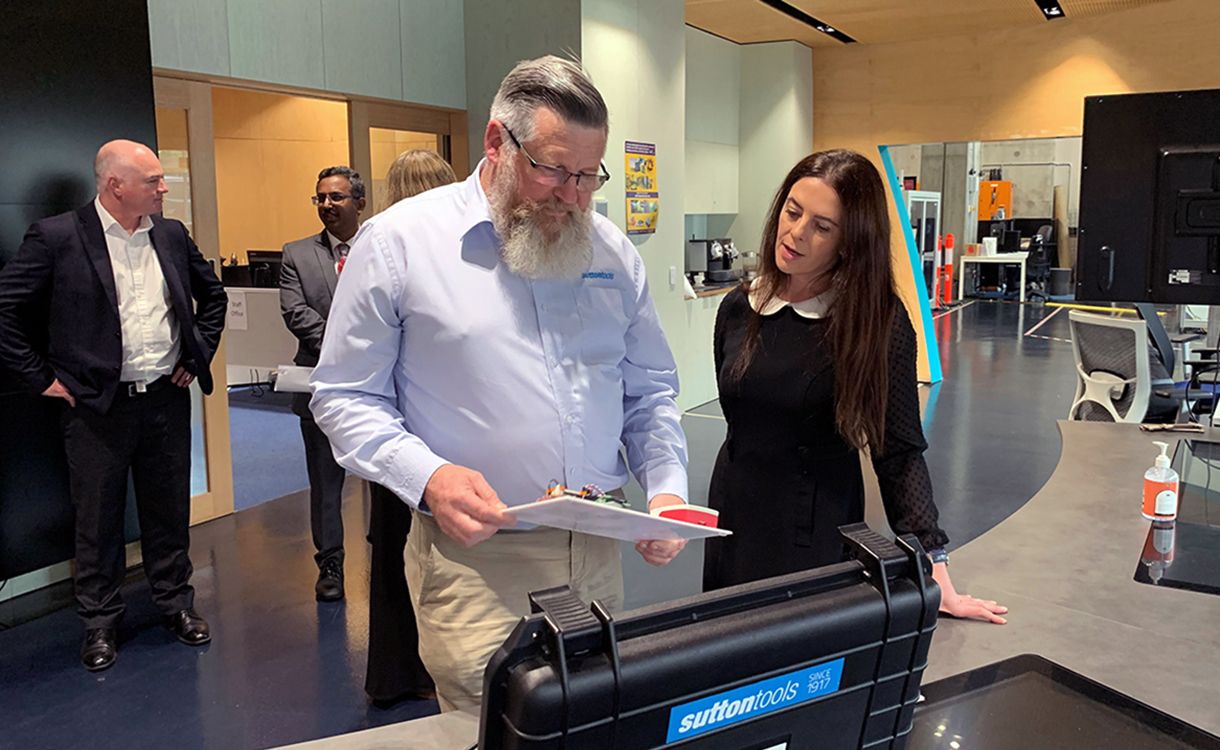 Dr Steve Dowey from Sutton Tools demonstrates factory in a box to Bronwyn Fox