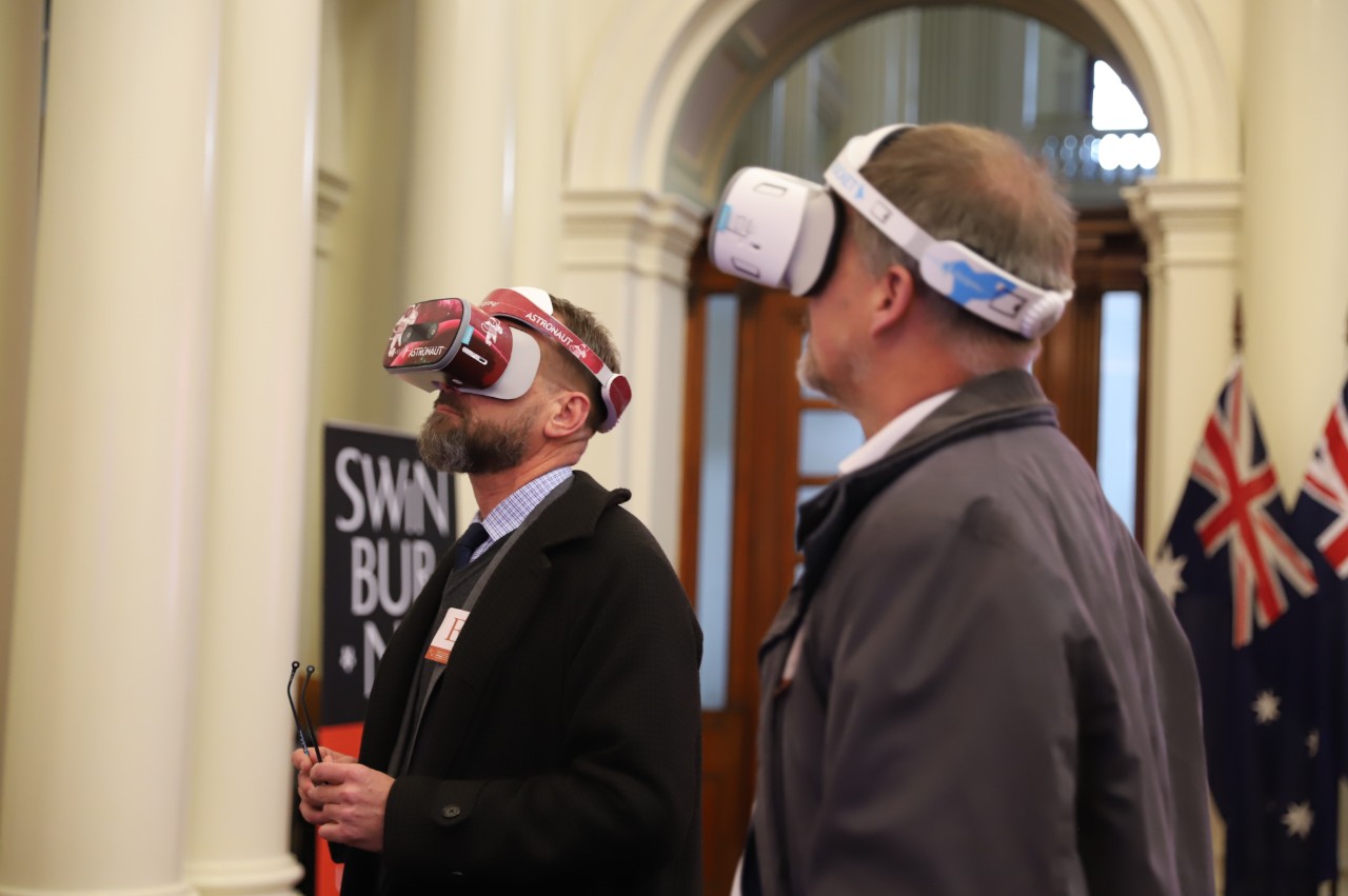 Visitors delving into the cosmos with OzGrav's virtual reality experience