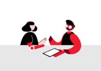 Illustration of two people having a conversation seated at a table with documents on it. One has glasses, the other has a prosthetic arm. 