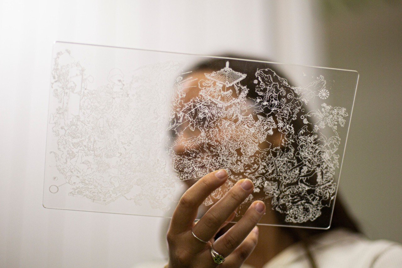 Laser etching on acrylic by a Communication Design student.