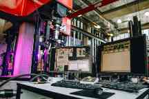 Computers at smart structures lab, machinery in background