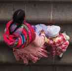 Mother walking with her child in Bolivia