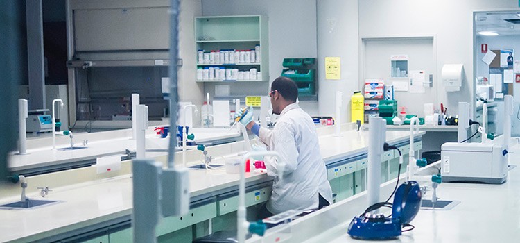 A member of our research team working in our laboratory. 