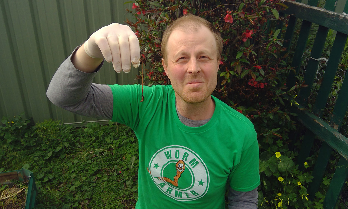 Dr Ivan Maksimov holding an earthworm
