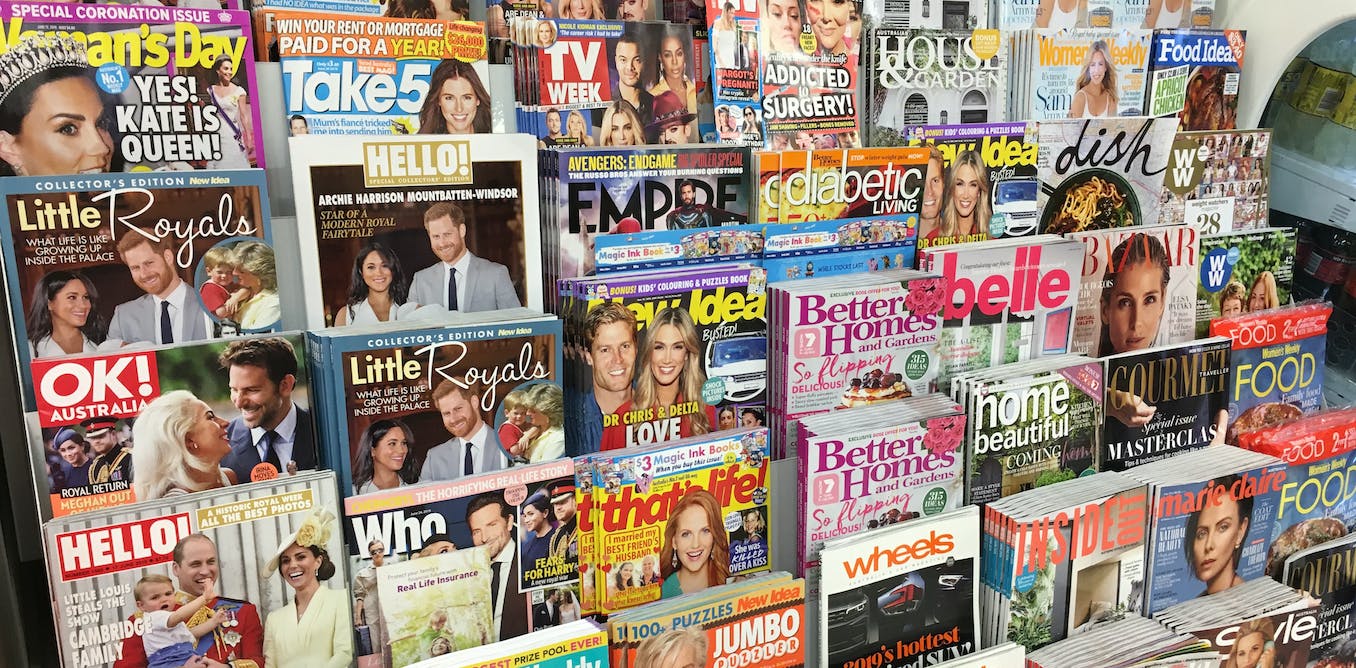 Print magazines on a shelf in a shop