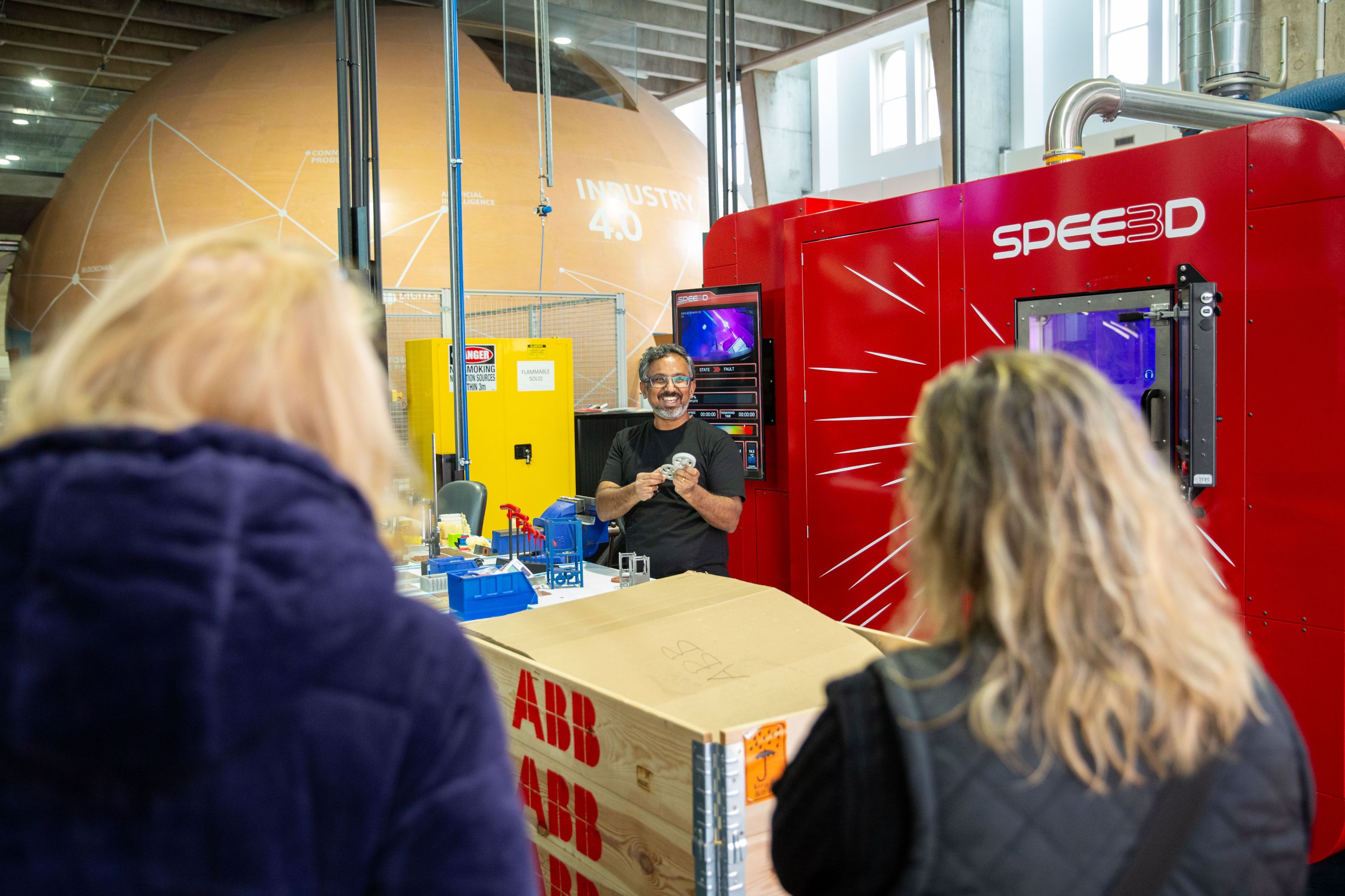 Professionals, academics and researchers standing