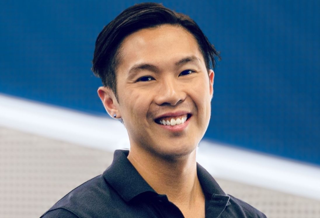 Swinburne staff member Dr Linus Tan smiling portrait