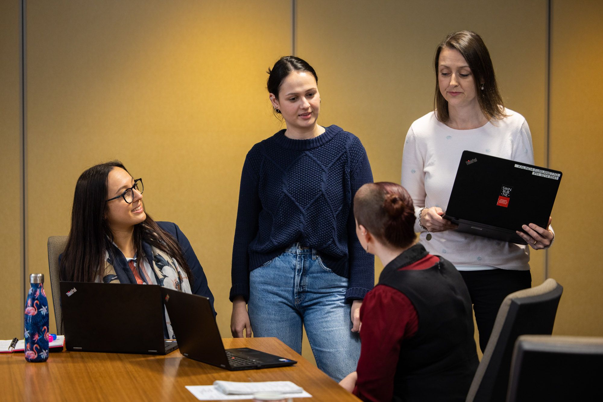 4 women having a conversation