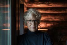 Maureen Thurston leaning on a door