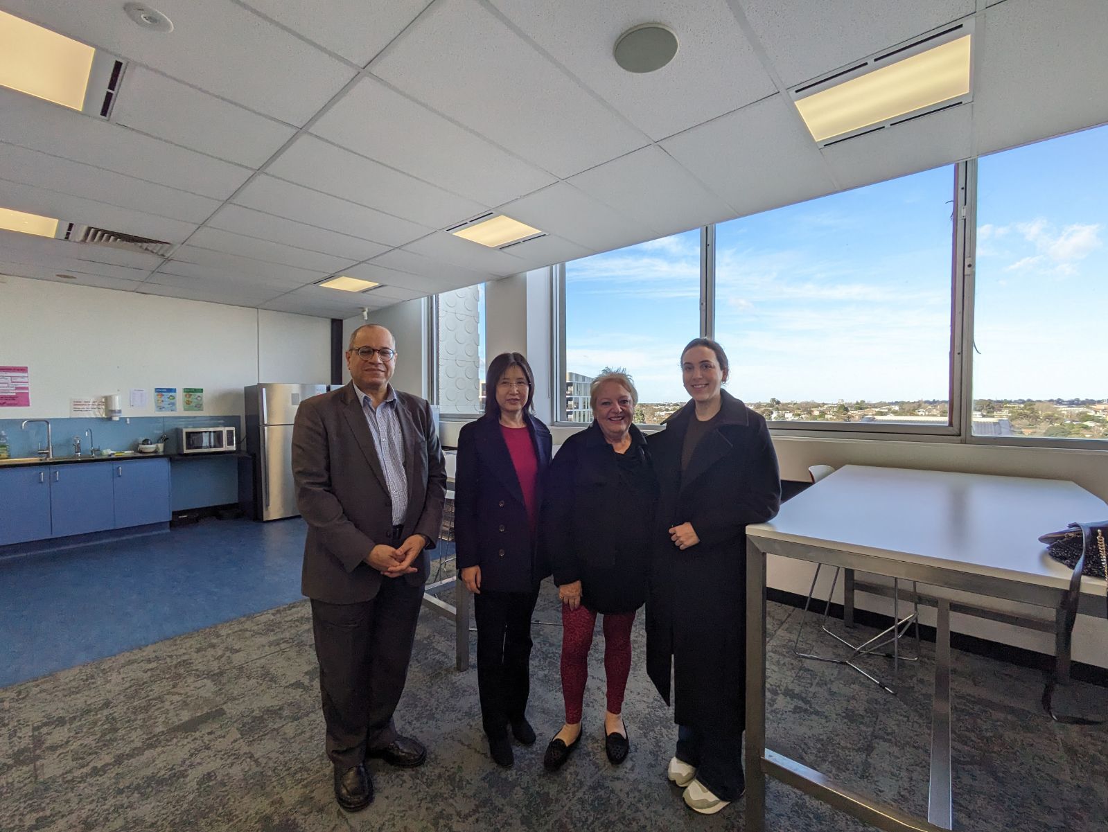 Scholarship recipient Randa Ibrahim with donor Marisa Iovenitti and engineering staff 