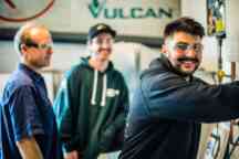 two trades students and their lecturer 