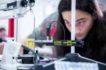 A student conducting a physics experiment.