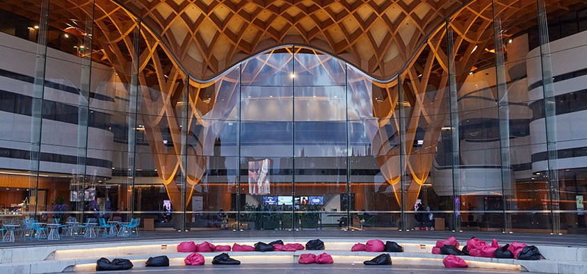Photo of large glass room within a public building