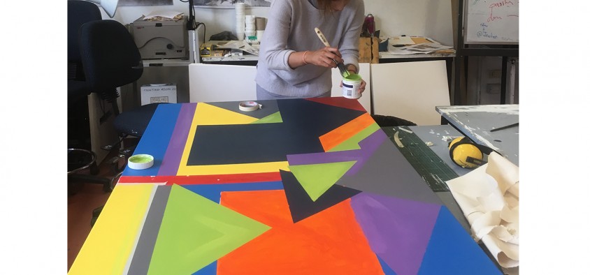 Visual arts student painting